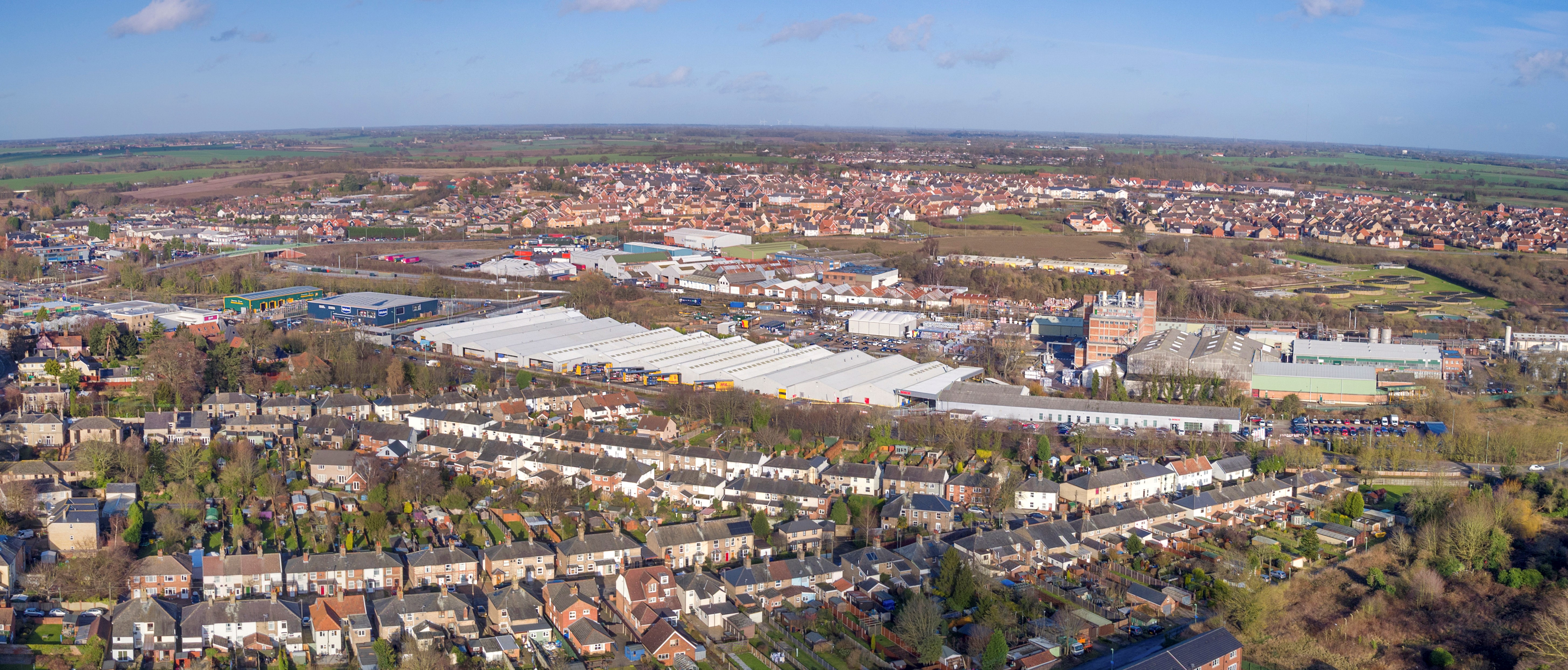Investment sale of 16.44 acre town centre industrial property to let property with development land